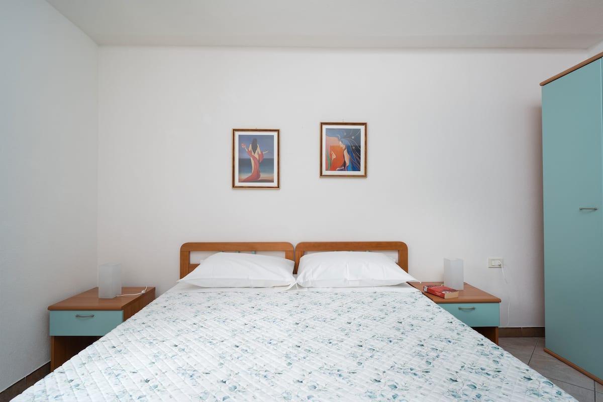 La Vela Blu — Rodzinny apartament z basenem