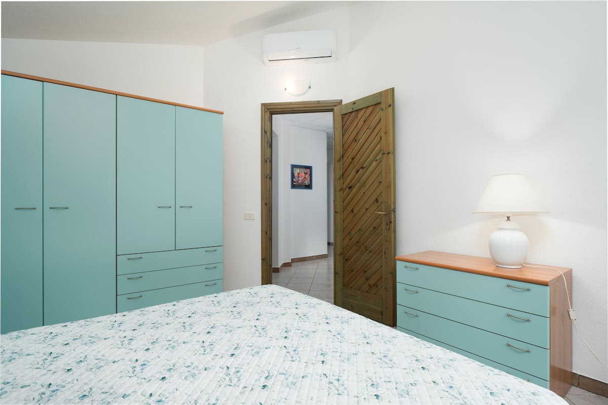 La Vela Blu — Rodzinny apartament z basenem